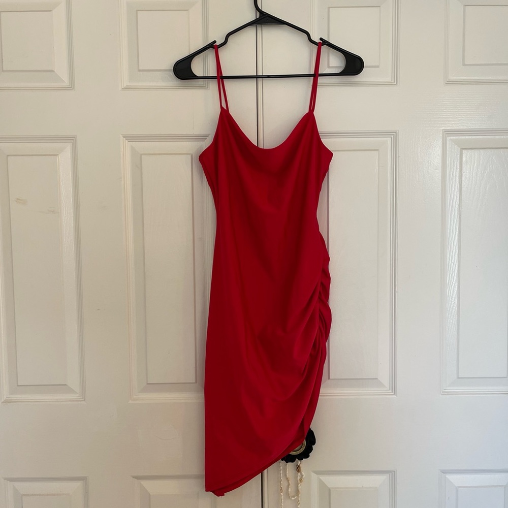 Bright red dress size large. It’s stretchy material and scrunches on one side